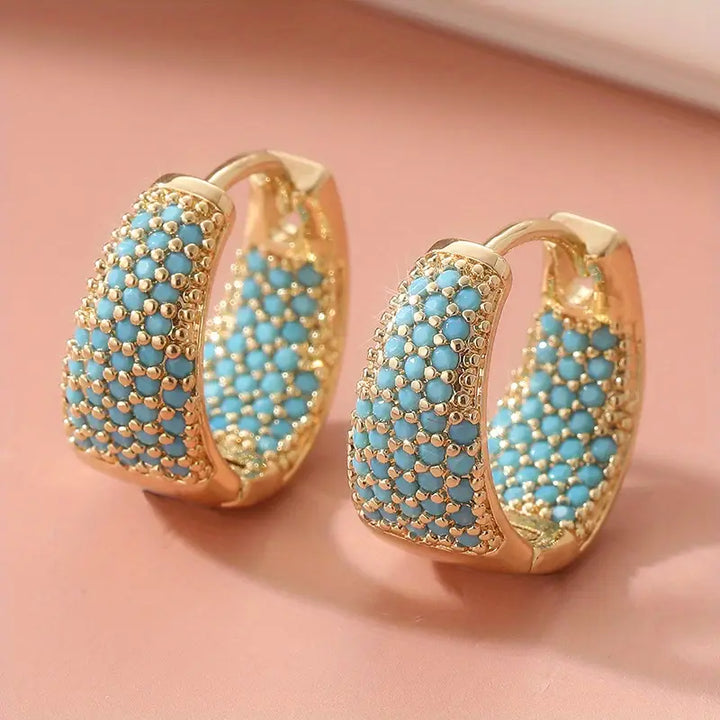 Pendientes de aro con cuentas de turquesa en tono color oro elegante