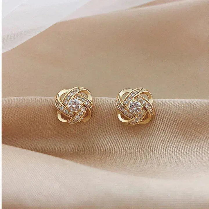 Pendientes de cristal con diseño de espiral color oro