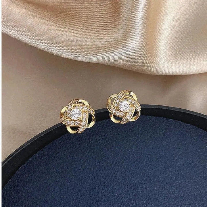 Pendientes de cristal con diseño de espiral color oro