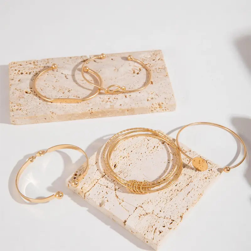 Conjunto de Pulseras de Color oro con Elegancia Sofisticada y Nudos