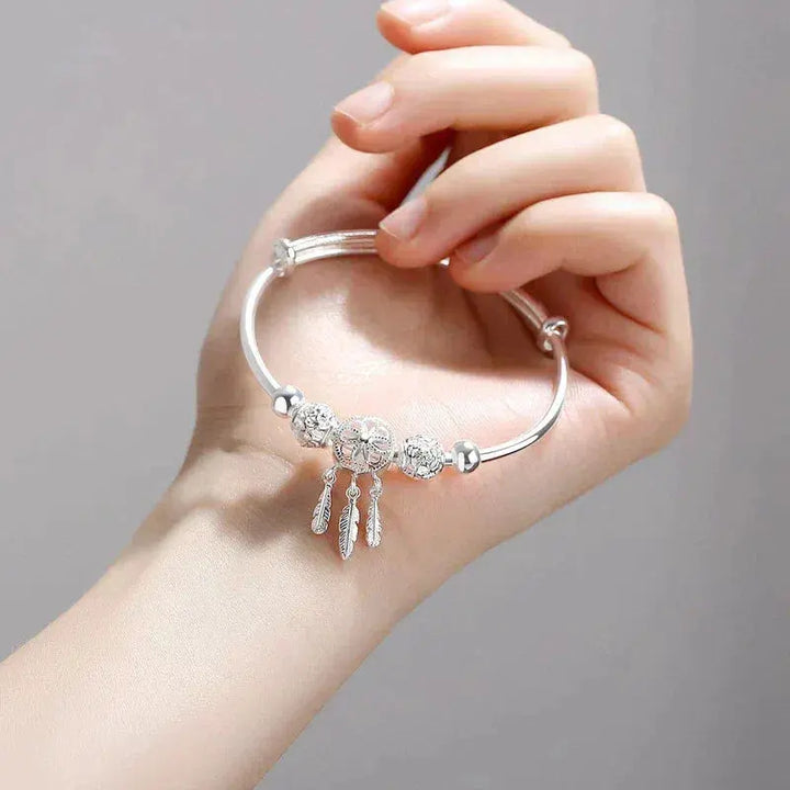 Pulsera de brazalete de atrapasueños color plata