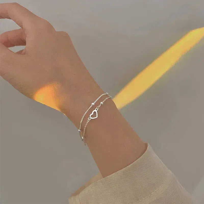 Pulsera de color plata con corazón y ajuste personalizable