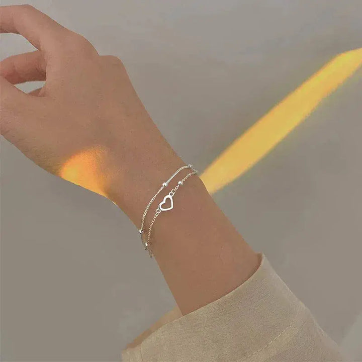 Pulsera de color plata con corazón y ajuste personalizable