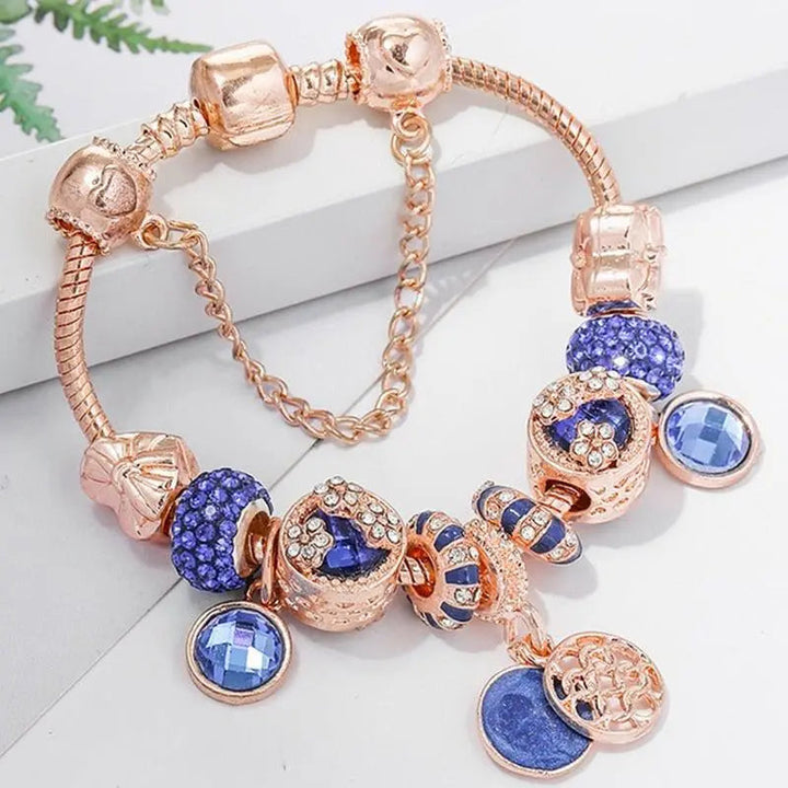 Pulsera en Rosa Color plata con Cristal Azul