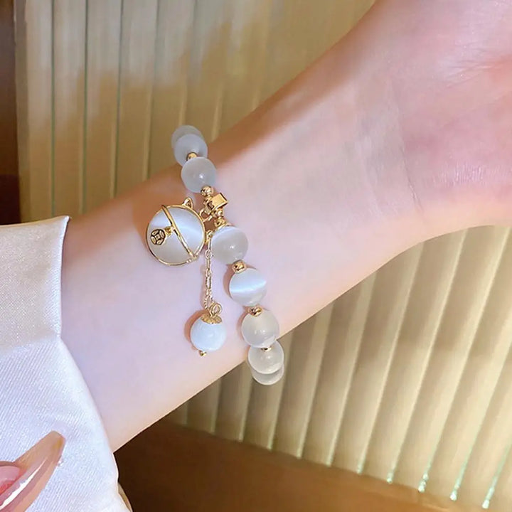 Pulsera con colgante de gato de la suerte