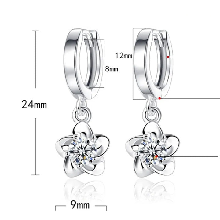 Pendientes de color plata esterlina con circonitas moradas y blancas
