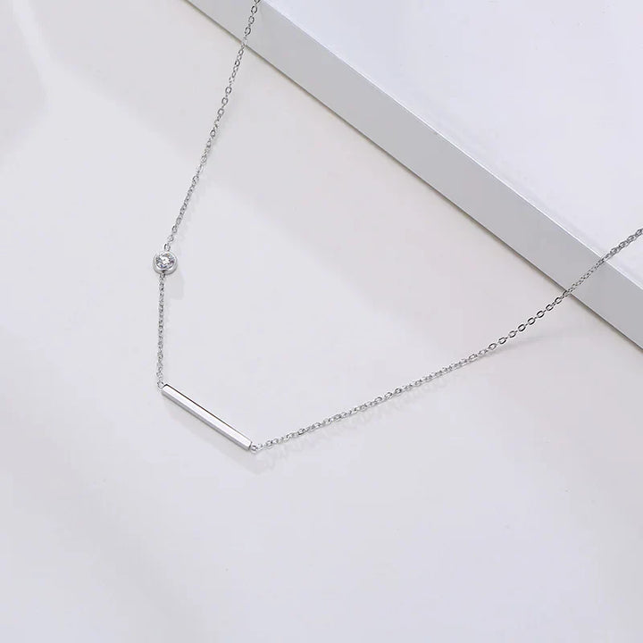 Collar de Cruz Lateral Brillante