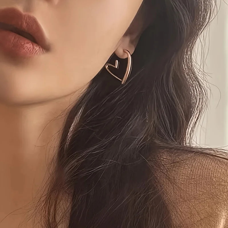 Elegantes Pendientes en Forma de Corazón de Oro Rosa