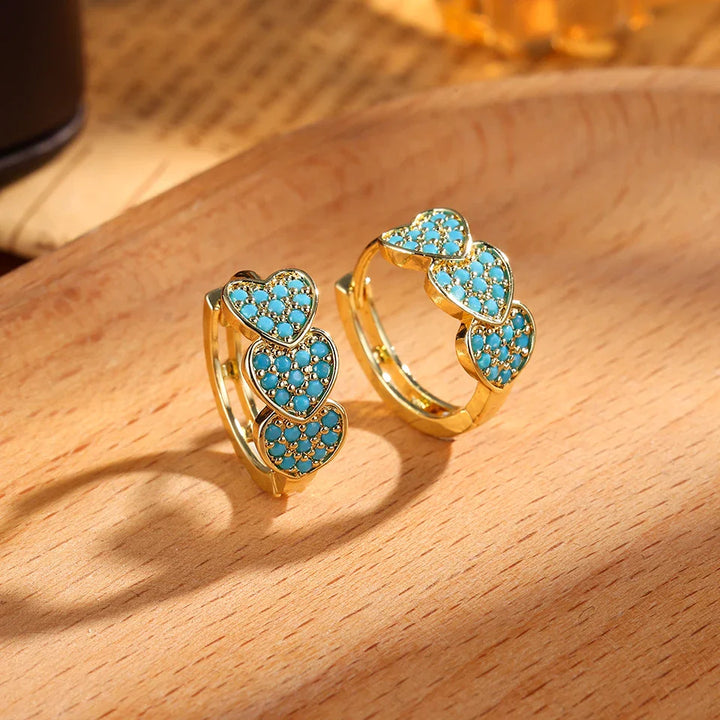 Pendientes de aro con flores en azul turquesa