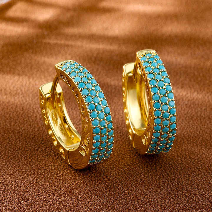Pendientes de aro con flores en azul turquesa
