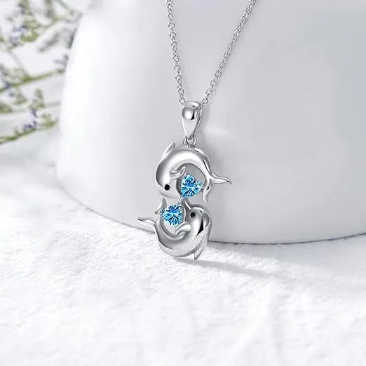 Collar de Cristal Azul con Delfín Gemelo Color plata