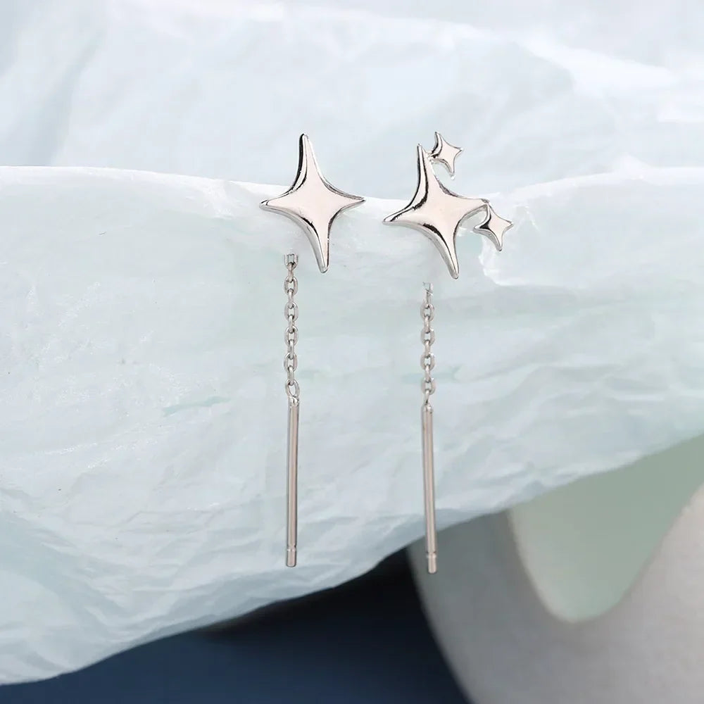 Pendientes de cadena en forma de estrella de color plata de ley