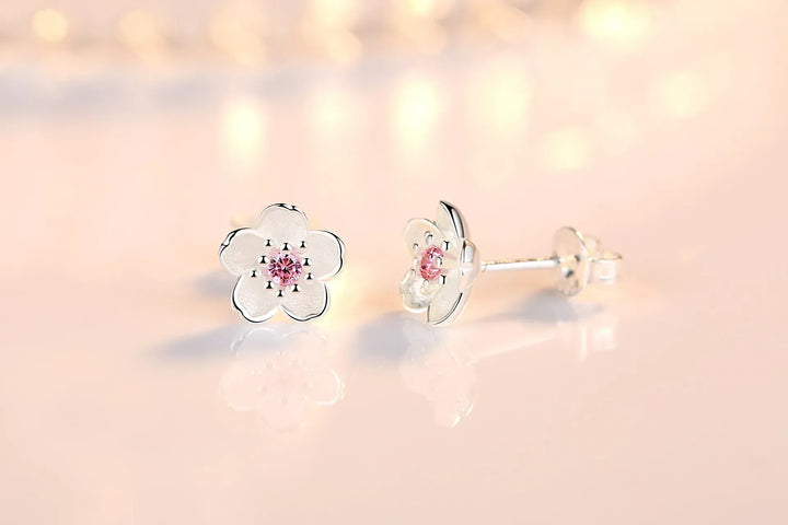 Pendientes de botón de flores de circonita
