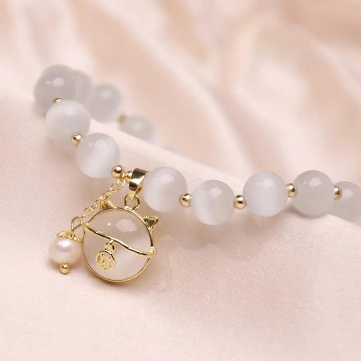 Pulsera con colgante de gato de la suerte