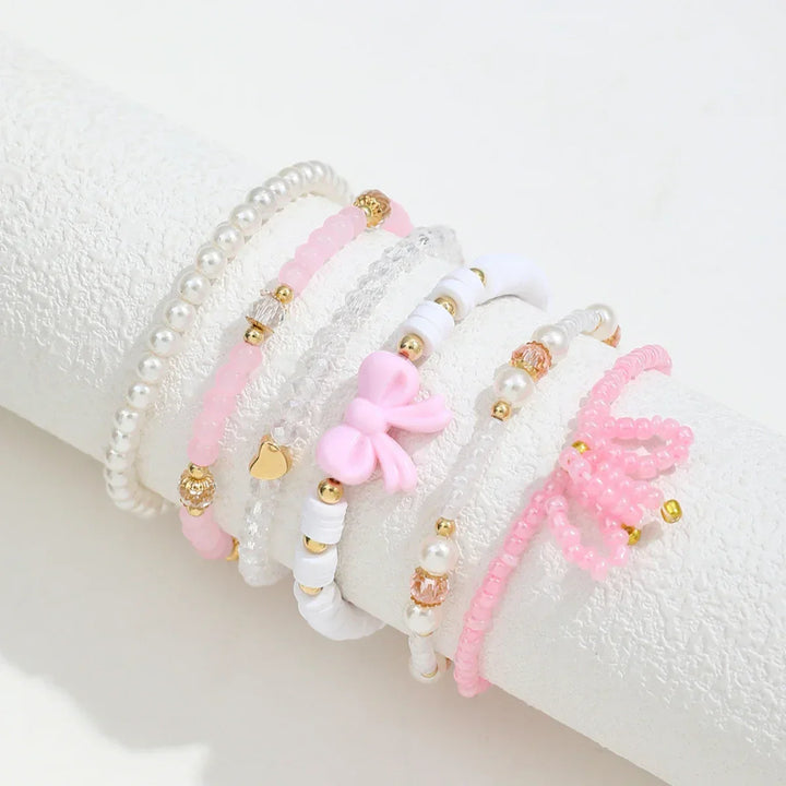 Conjunto de Pulseras y Amor