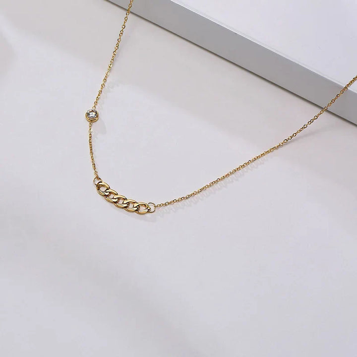 Collar de Cruz Lateral Brillante