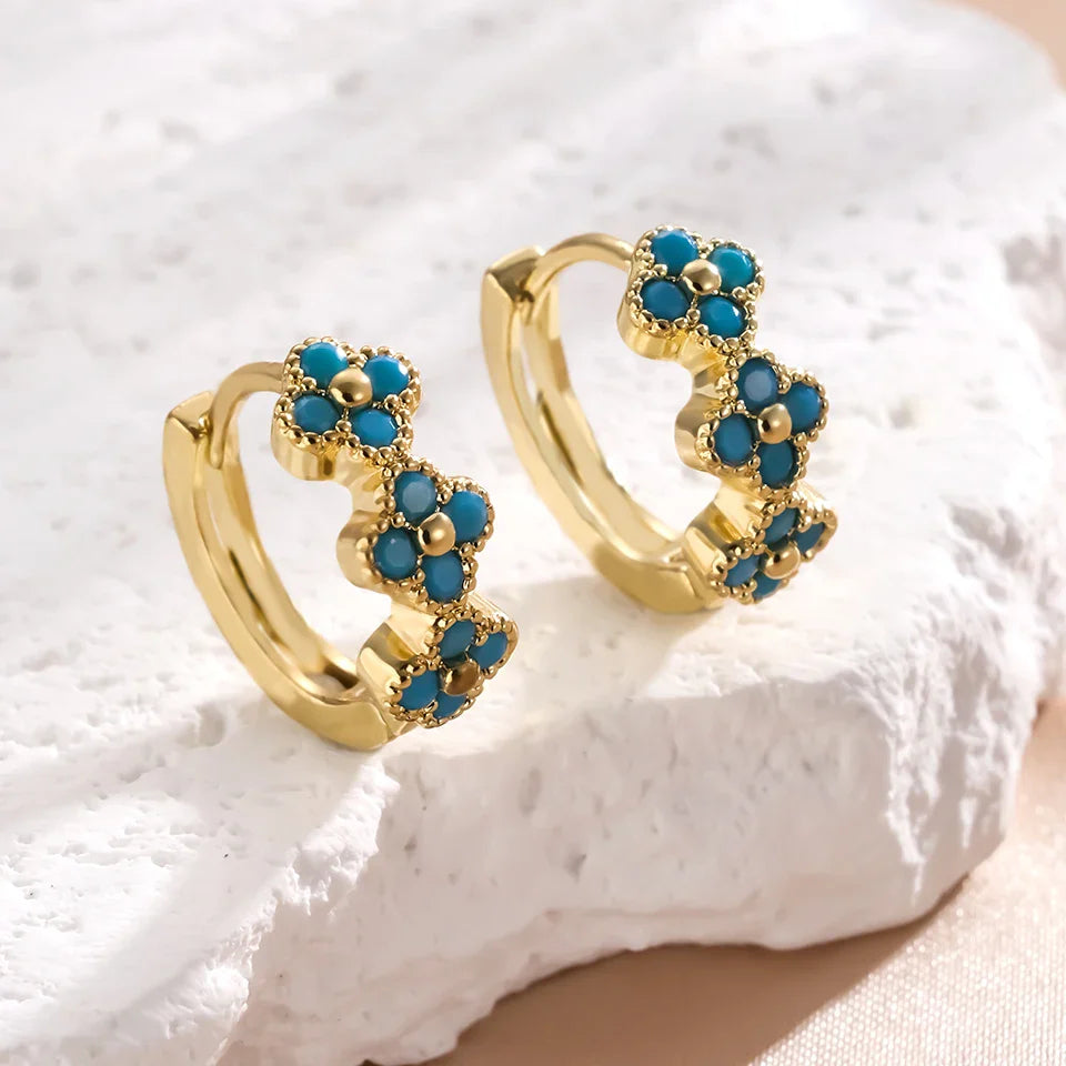 Pendientes de aro con flores en azul turquesa