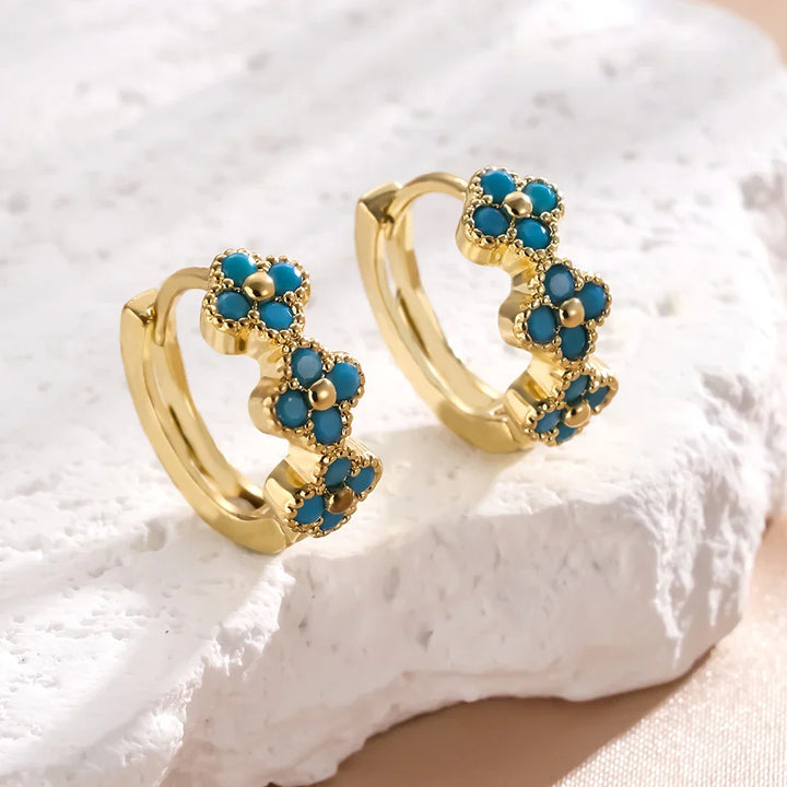 Pendientes de aro con flores en azul turquesa