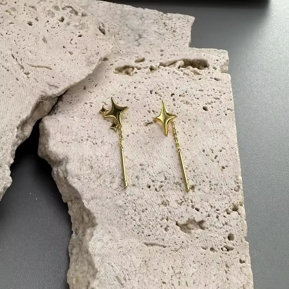 Pendientes de cadena en forma de estrella de color plata de ley