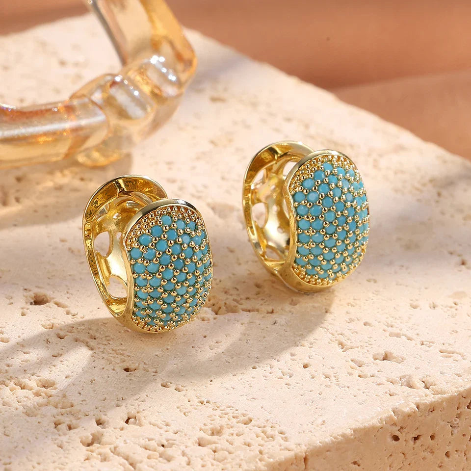 Pendientes de aro con flores en azul turquesa
