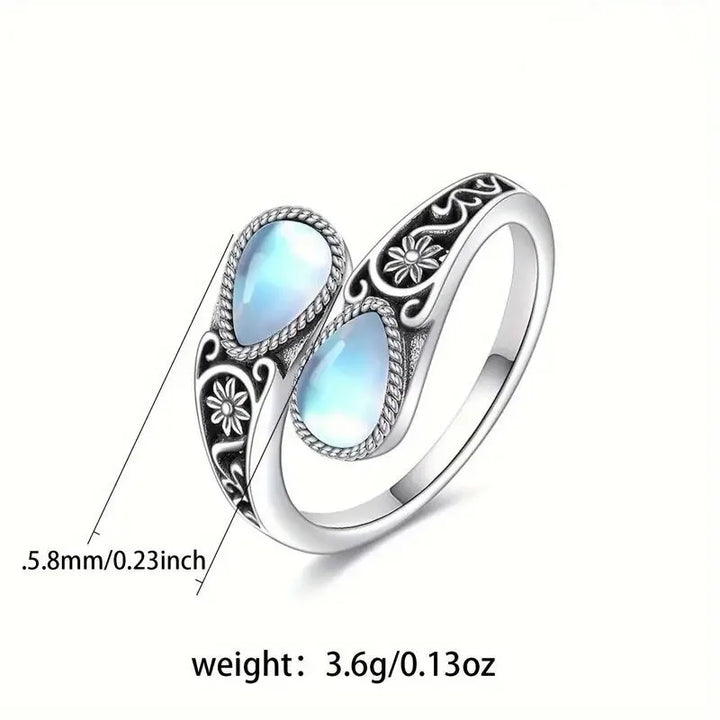 Anillo de flores de piedra lunar elegante