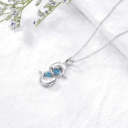 Collar de Cristal Azul con Delfín Gemelo Color plata