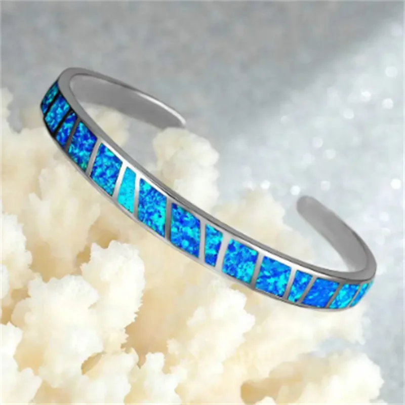 Brazalete Ajustable de Ópalo de Fuego Azul Elegante de Color plata