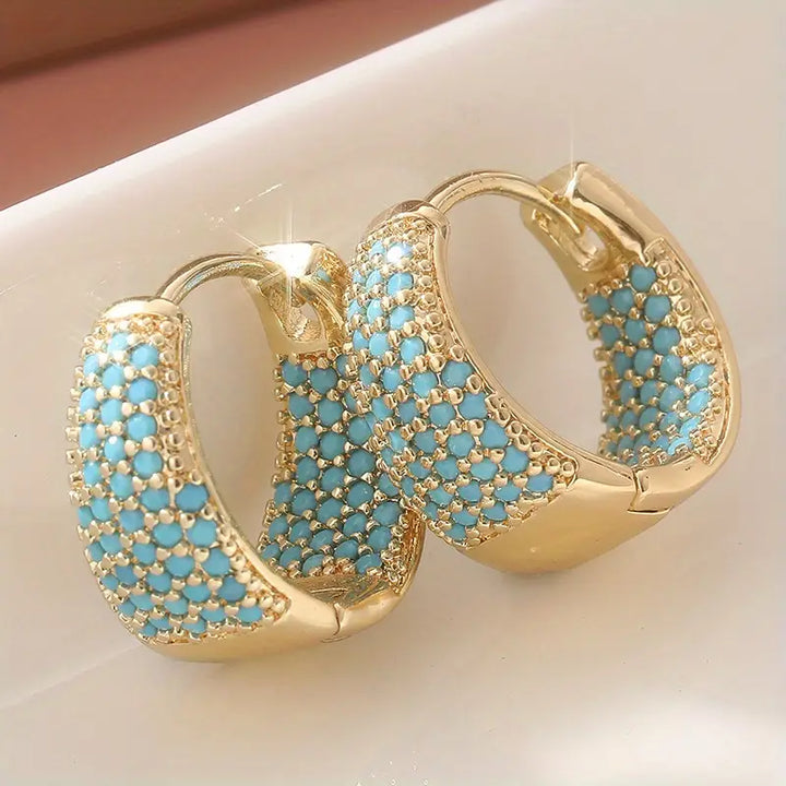 Pendientes de aro con cuentas de turquesa en tono color oro elegante