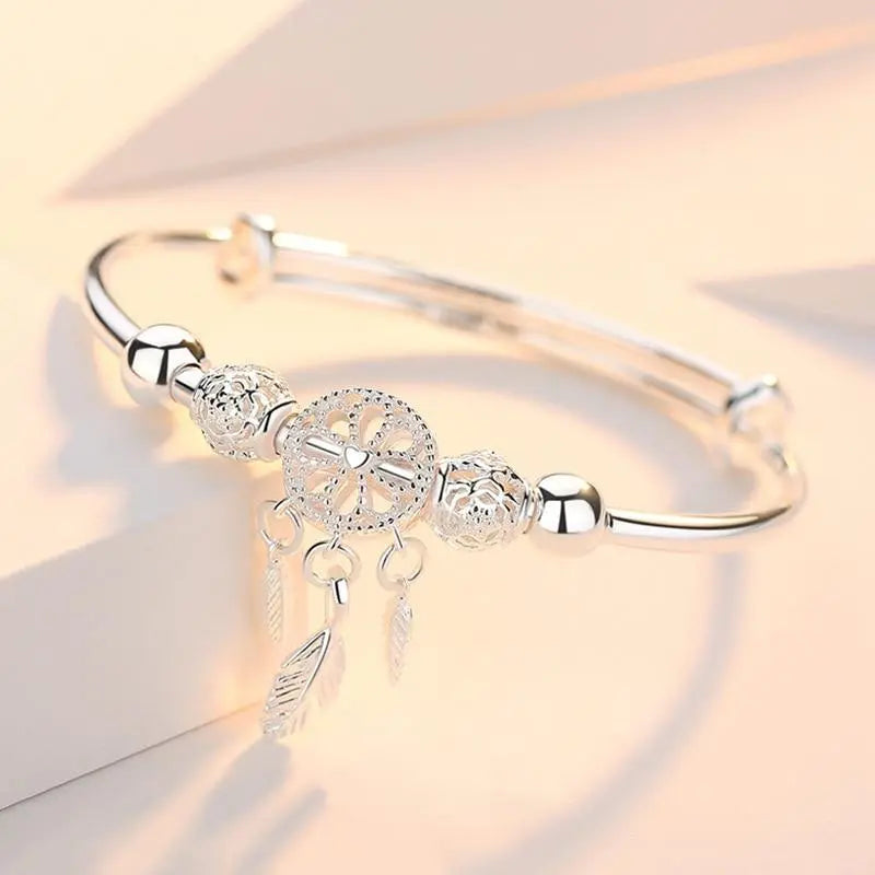 Pulsera colgante de atrapasueños color plata