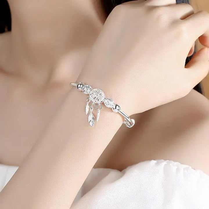 Pulsera colgante de atrapasueños color plata