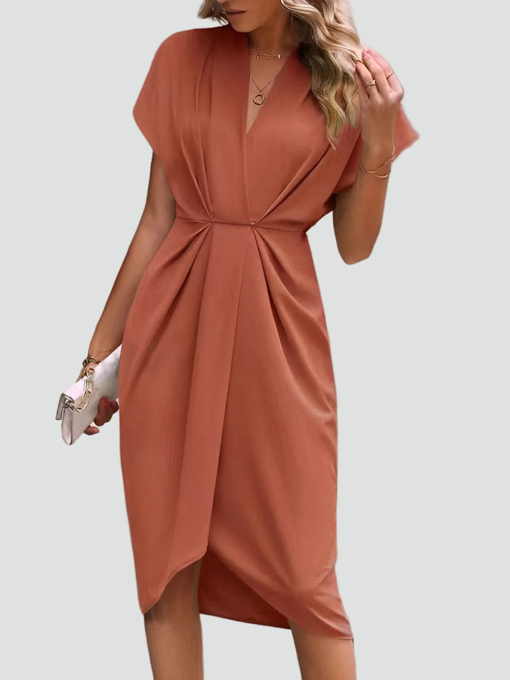 Sofisticado vestido de cóctel midi envolvente en Koraal