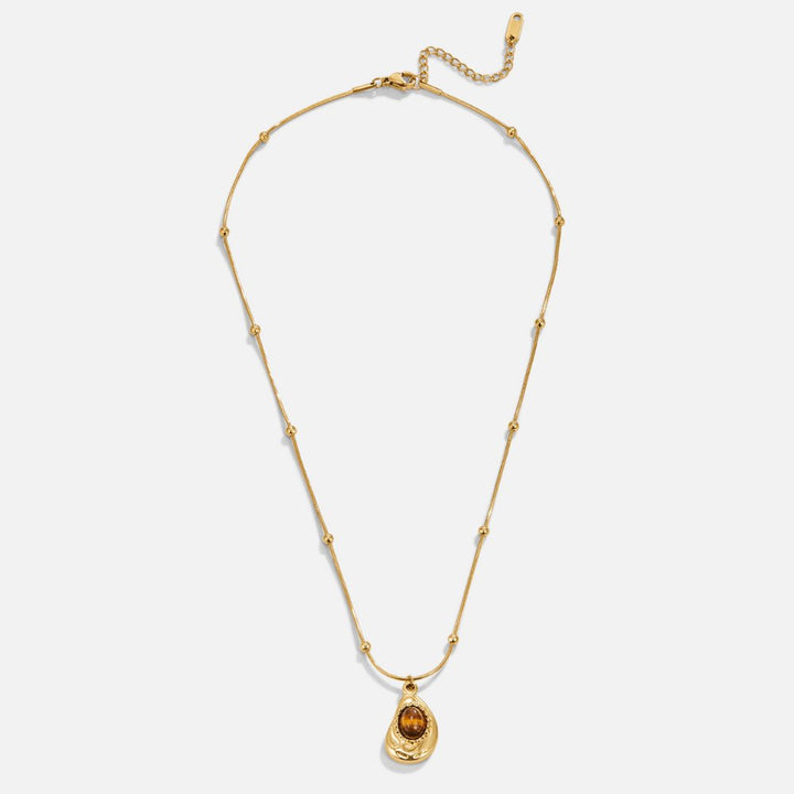 Elegante collar de color oro con piedra ojo de tigre